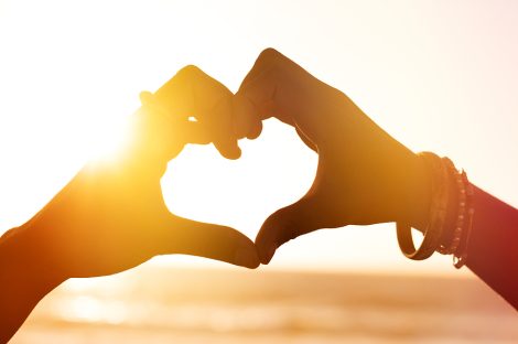 Hands forming the shape of a heart. Couples counseling provides a safe, supportive space for partners to work through relationship challenges, enhance communication, and deepen their connection.